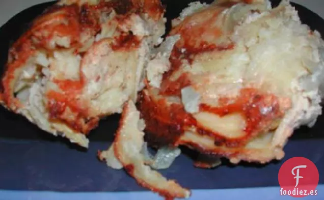 Patatas Con Salsa de Cebolla y Queso Parmesano