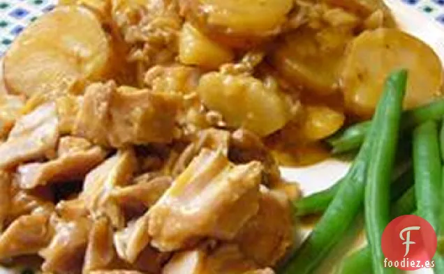 Chuletas de Cerdo y Patatas Fritas con Queso