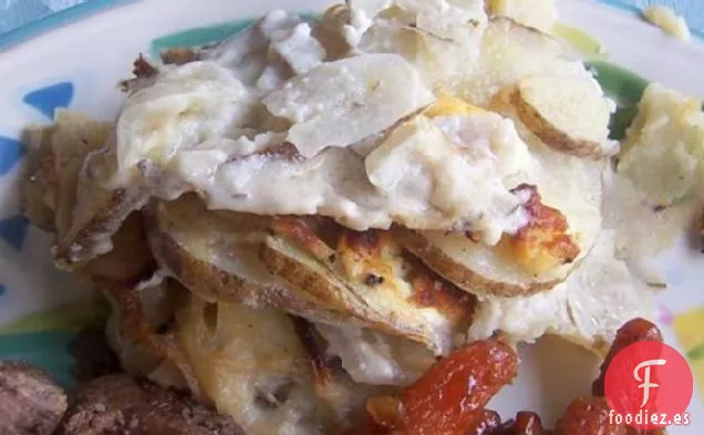 Patata, Cebolla Caramelizada y Queso de Cabra Gratinado