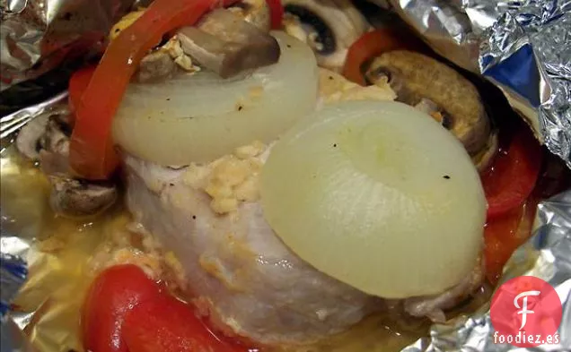 Chuletas de Cerdo Empanadas Al Horno Húmedas en Salsa de Champiñones