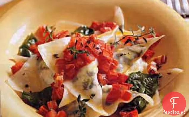 Ravioles de Rúcula y Queso de Cabra con Mantequilla de Panceta y Tomate