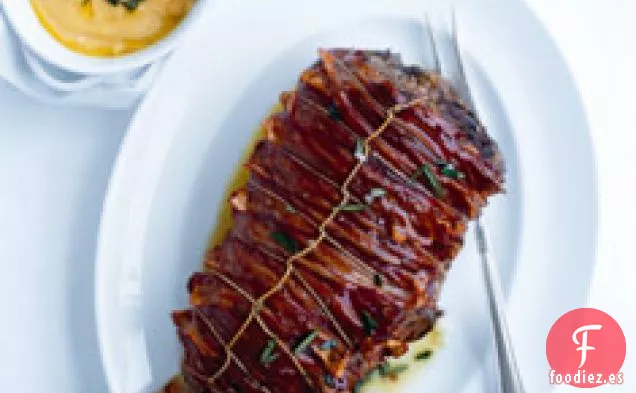 Cordero Asado Con Tocino Y Romero