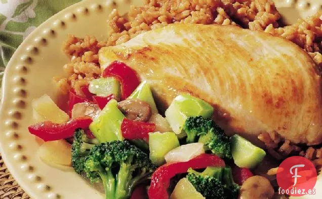 Pollo Salteado con Arroz Asiático
