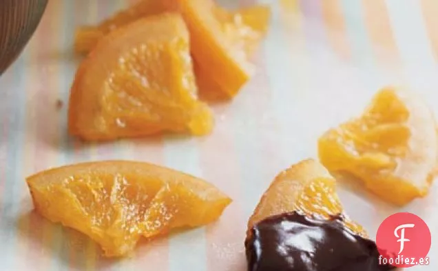 Rodajas de Naranja Confitadas con Salsa de Ganache