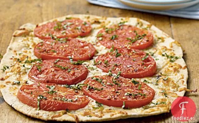 Pizza de Tomate Gorgonzola y Levantador de Hipotecas