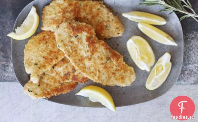 Escalopes de cerdo desmenuzado de limón, parmesano y piñones