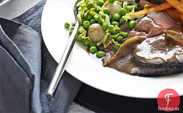 Guisantes con chalotes y lechuga