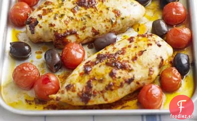 Pollo con harissa y tomates