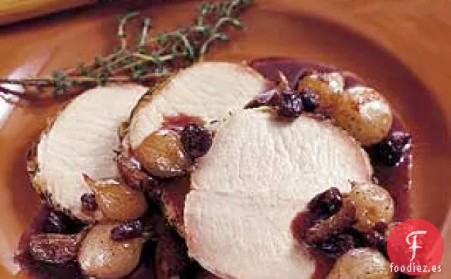 Lomo de Cerdo en Salmuera con Cebolla, Pasas y Compota de Ajo