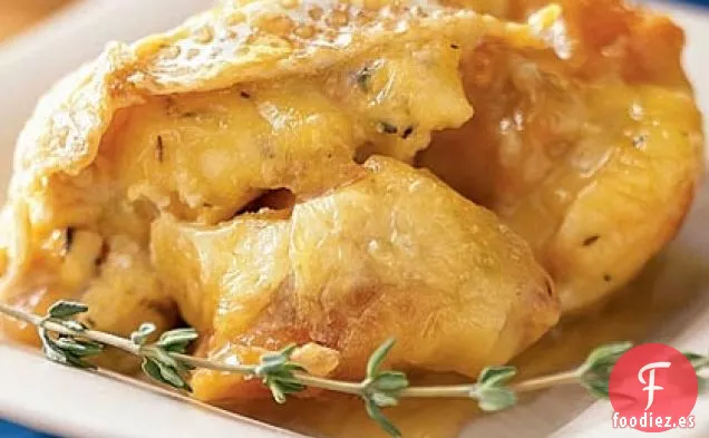 Budín de Pan Cítrico con Crema Pequeña y Salsa de Caramelo de Fruta de la Pasión