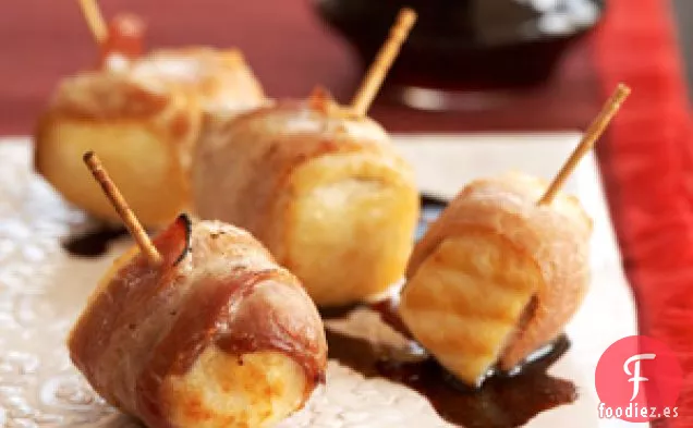 Bocados de fletán envueltos en tocino
