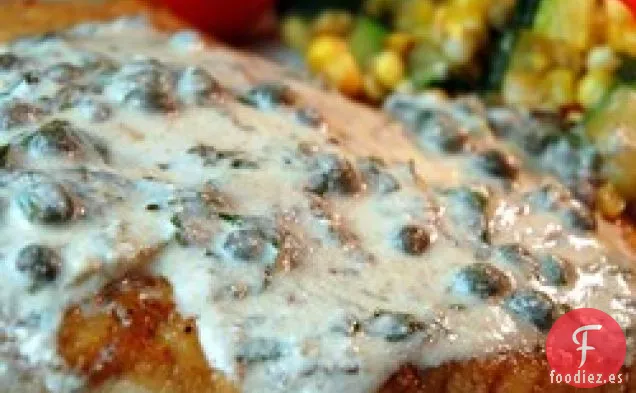 Filete De Fletán Frito En Sartén Con Salsa Verde Claro