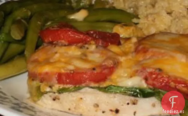 Chuletas de cerdo con tomates y judías verdes