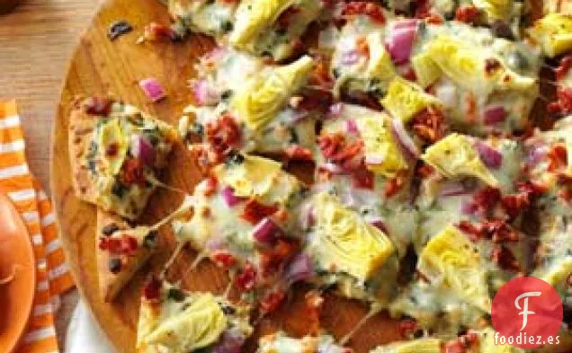 Pizza con salsa de alcachofas y espinacas