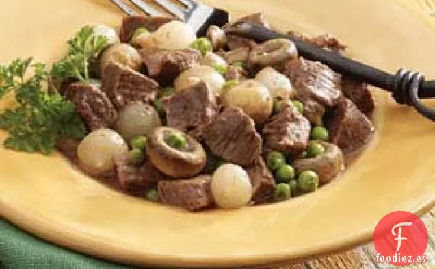 Estofado de ternera con champiñones y cebolla