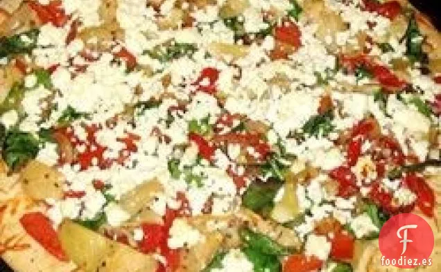 Pizza de pimientos, cebollas y queso feta