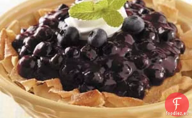 Strudel de arándanos con forma de nido de pájaro
