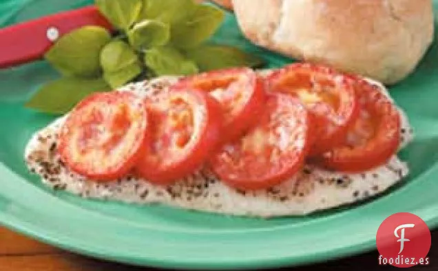 Pescado al horno con tomate y albahaca