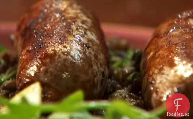 Salchicha con lentejas al ajillo