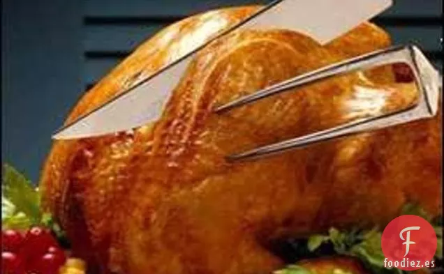 Pato Asado Relleno Servido Con Jus De Clementina