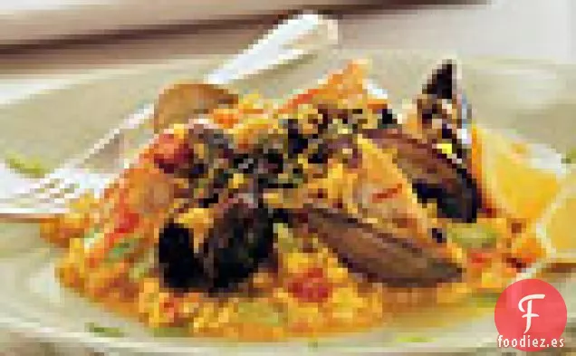 Mejillones, Almejas y Camarones con Risotto de Azafrán y Condimento de Oliva Verde