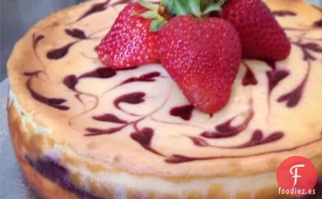Tarta de Queso con Remolino de Frambuesa