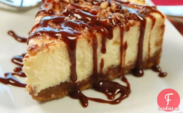 Tarta De Queso Praliné Con Salsa De Caramelo Dulce Caliente