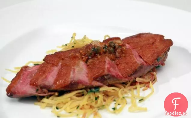 Pato a la Naranja con Patatas Fritas con Hierbas