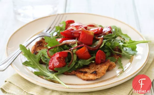 Milanesa De Pollo Con Rúcula Y Tomates