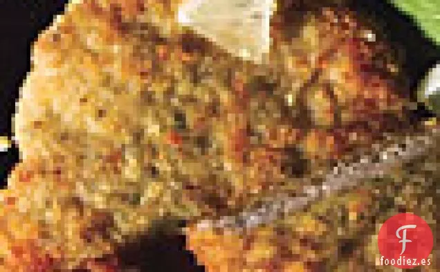 Chuletas de Cerdo Crujientes con Alcaparras, Limón, Rúcula y Huevos Picados