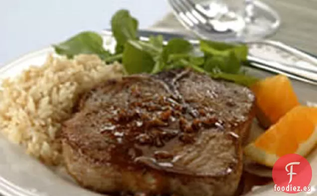Chuletas de Cerdo Estofadas con Salsa de Naranja y Mostaza