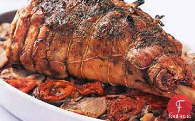 Pierna de Cordero Asado sobre Patata, Berenjena y Tomate Tian