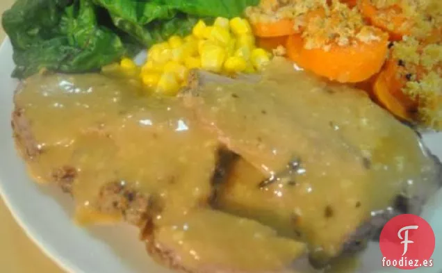 Pierna de Cordero Asada a la Parrilla con volantes de mantequilla