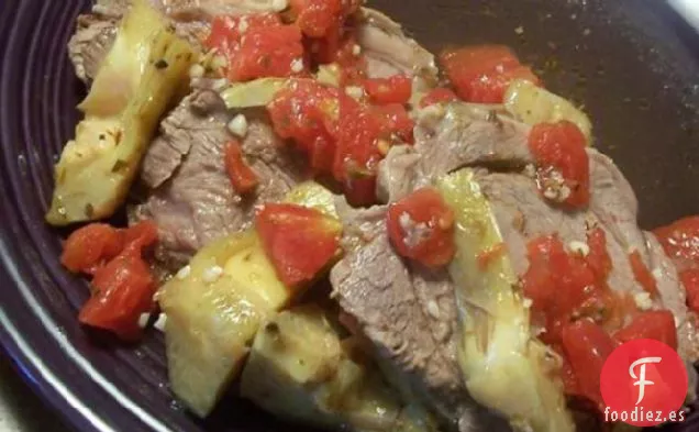 Cordero Asado Con Tomates y Corazones de Alcachofa